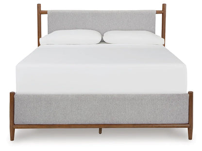 Lyncott Queen Upholstered Panel Bed